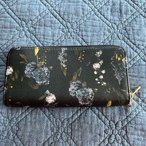 A New Day brand. Clutch. Wallet. Black with floral pattern.